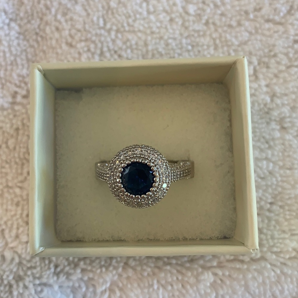 White gold tone sapphire ring
